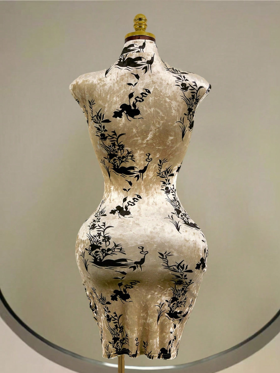 Slip into timeless elegance with this stunning velvet cheongsam dress! Featuring intricate Mistrie printed details, this Asian-inspired piece combines traditional charm with modern sophistication. The luxurious velvet fabric drapes beautifully, creating a flattering silhouette that's perfect for special occasions, cultural celebrations, or whenever you want to turn heads. Whether you're attending a gala or making a fashion statement, this dress delivers that coveted blend of grace and glamour. Embrace your 