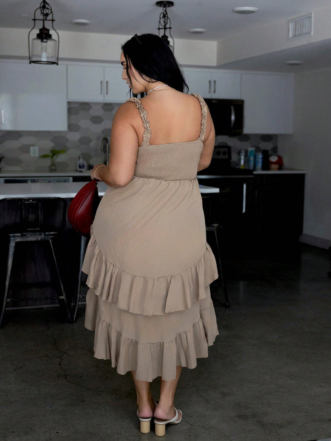 Embrace your curves in this charming khaki dress that's equal parts vintage vibes and modern comfort. The delicate ruffle hem adds a flirty touch that catches eyes and turns heads, while the relaxed fit lets you move freely through summer adventures. Whether you're celebrating a special day or just living your best life, this plus-size beauty delivers effortless style without the fuss. Soft, breathable fabric keeps you cool when the heat's on, and the timeless khaki shade pairs with everything in your close