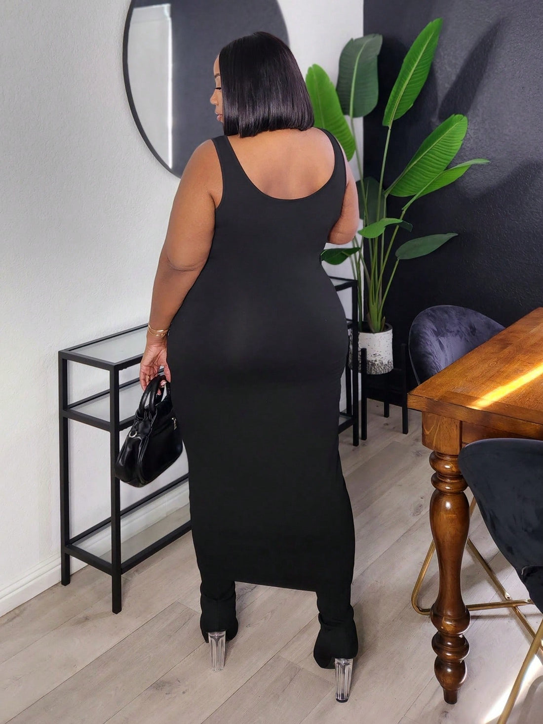 Flaunt your curves with confidence in this fabulous plus-size bodycon dress, expertly designed to celebrate pear-shaped figures. The sleek, solid silhouette hugs you in all the right places while providing the support and comfort you deserve. Whether you're heading out for casual coffee or a romantic dinner, this versatile stunner transitions seamlessly from day to night. Feel amazing, look stunning, and own every room you walk into!