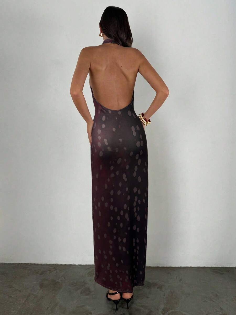 Turn heads this season with our striking halter neck dress, featuring an eye-catching deer print that commands attention. The sleeveless silhouette offers a modern, sophisticated edge perfect for autumn and winter gatherings, while the halter neckline flatters and elongates. Whether you're heading to an evening party or night out, this versatile piece delivers bold style with effortless elegance. The thoughtful design balances statement-making prints with wearable comfort, making it an essential addition to