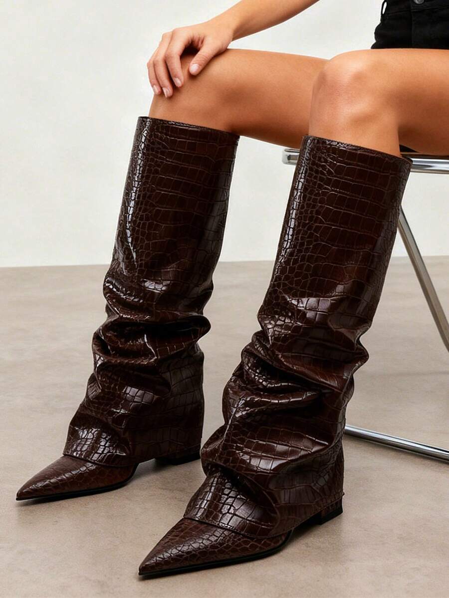 Outsole view of Stylish Knee-High Slouchy Shark Boots with Chunky Heels for Parties and Office Wear for knee high boot styling