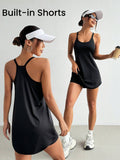 solid black scoop neck tank sports mini dress with built in shorts, racerback straps and front pockets image 1