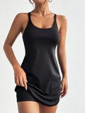 solid black scoop neck tank sports mini dress with built in shorts, racerback straps and front pockets image 4