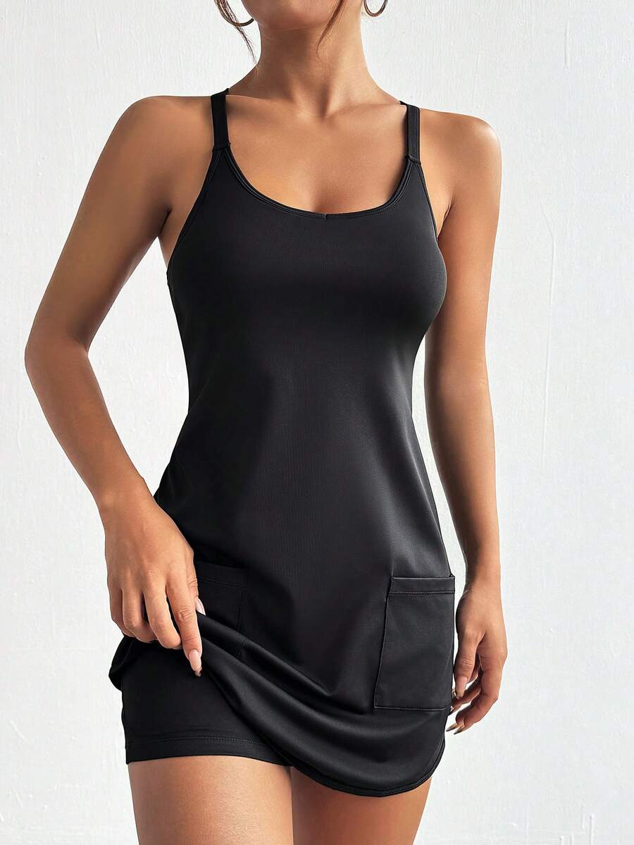 solid black scoop neck tank sports mini dress with built in shorts, racerback straps and front pockets image 4