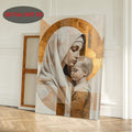 Wide interior view of the flat Mary and infant Jesus wall canvas displayed against a white paneled wall on a wood floor