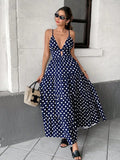 Navy blue and white polka dot spaghetti strap maxi dress, front view