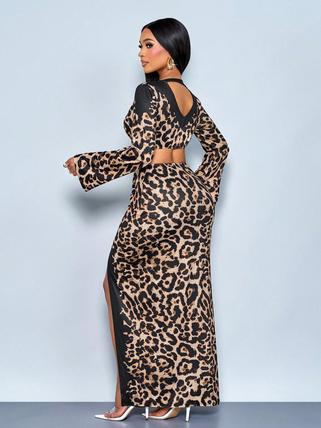 Unleash your wild side this autumn with our stunning leopard print dress! This chic number features a flattering V-neckline and asymmetrical high slit that adds just the right amount of sass to your everyday look. Whether you're dashing through the city for errands or heading to brunch with friends, this versatile piece transitions seamlessly from commute to shopping spree. The bold leopard pattern brings instant sophistication while the playful cut keeps things fun and flirty. Dress it up with heels or dow