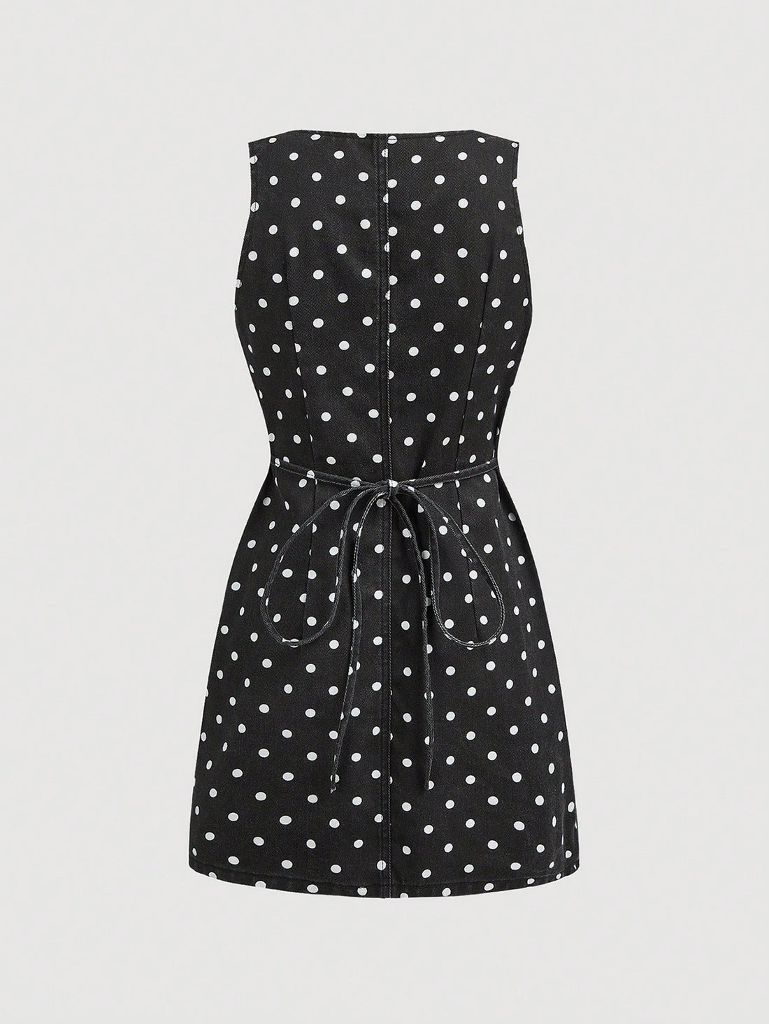 Step back in time with this charming vintage-inspired denim dress featuring a classic polka dot pattern that brings instant personality to your everyday look. The flattering V-neckline and sleeveless cut offer a breezy, effortless vibe perfect for warm weather styling. Crafted from durable denim, this versatile piece transitions seamlessly from casual outings to relaxed weekend adventures. Pair it with sneakers for a laid-back feel or dress it up with accessories for something a little more special. A timel