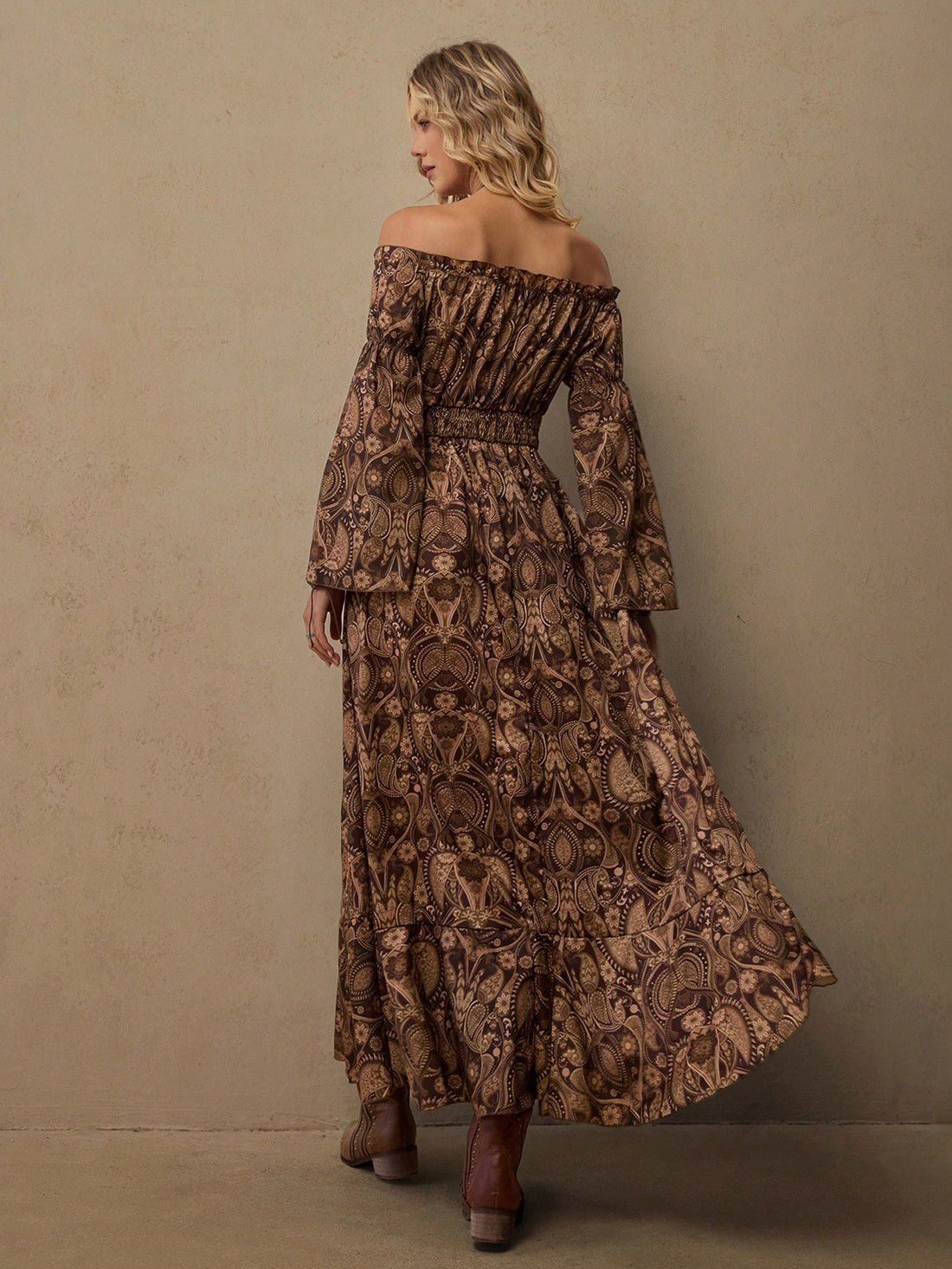 Escape to your next adventure in effortless style with this boho beauty. The off-shoulder neckline and cinched waist create a flattering silhouette, while the flowing A-line skirt moves with you through every season. Rich brown print details add that wanderlust-worthy charm perfect for autumn getaways and winter retreats. Whether you're exploring coastal towns or cozying up at mountain lodges, this dress transitions seamlessly from day to night. Comfortable, chic, and undeniably Instagram-worthy—your vacati
