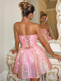 Pink sequin cocktail dress with fitted bodice