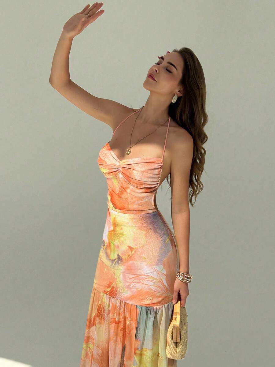 Step into summer style with this romantic floral print dress, your ideal companion for romantic getaways and special occasions. The delicate spaghetti straps offer a feminine touch while the soft, flowing fabric moves gracefully with you. Blooming florals in rich, eye-catching hues create an effortlessly chic aesthetic that works for beachside dates, garden parties, or sunset strolls through charming vacation towns.