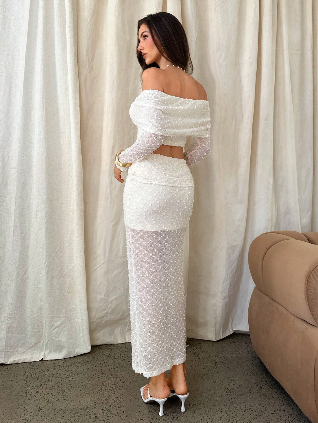 Step into timeless style with this charming vintage-inspired 2-piece set! The long-sleeve polka dot top pairs perfectly with a flattering low-waist long skirt, creating an effortlessly chic silhouette that celebrates retro elegance. Ideal for layering through autumn and winter, this set brings nostalgic flair to your seasonal wardrobe. Whether you're dressing up for a special occasion or keeping it casual, this playful ensemble delivers vintage charm with modern comfort. A wardrobe essential that proves cla