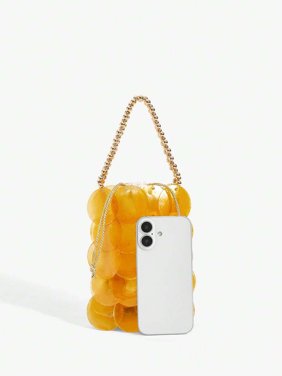 Orange mermaid scale drawstring bag with translucent shell discs