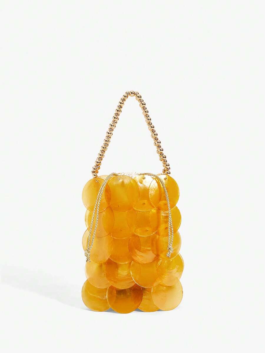 Amber orange shell disc mini handbag with gold bead wrist handle