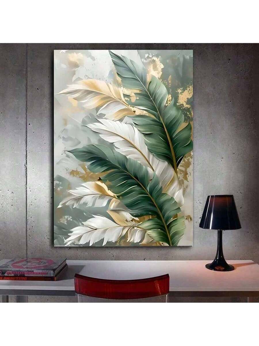 Green leaf wall art on concrete wall above desk