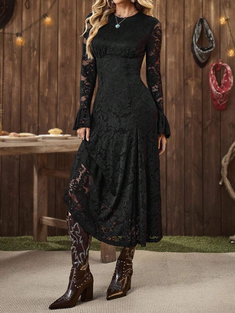 Back view of elegant A-line lace dress in midi length