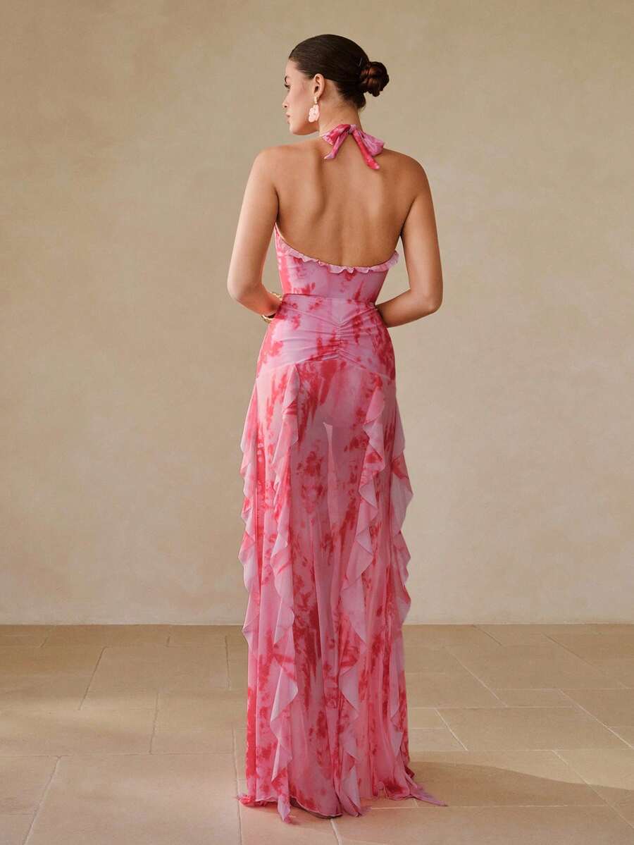 Make a splash this season with our Elegant Ombre Floral Ruffle Strap One-Piece Swimsuit &amp; Skirt Set. Featuring a stunning gradient ombre design paired with delicate floral prints, this two-piece ensemble combines sophistication with playful style. The ruffle strap detailing adds feminine charm, while the coordinating skirt offers versatile coverage for beach days, poolside lounging, or vacation getaways. 