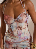 Back view of pink and lilac halter mesh dress with open back