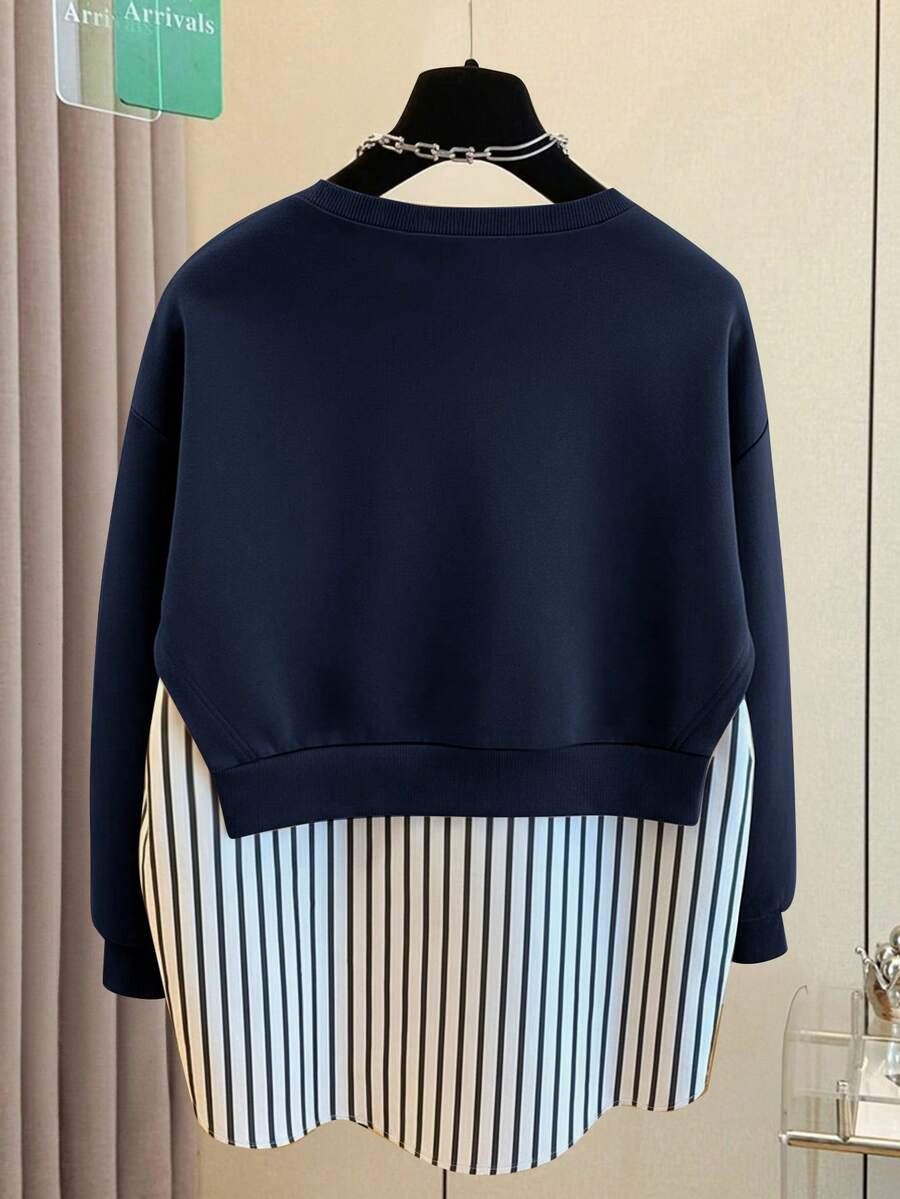 Front view of Chic Women's Solid Color Vertical Stripe Crew Neck Long Sleeve Sweatshirt in Navy Blue color