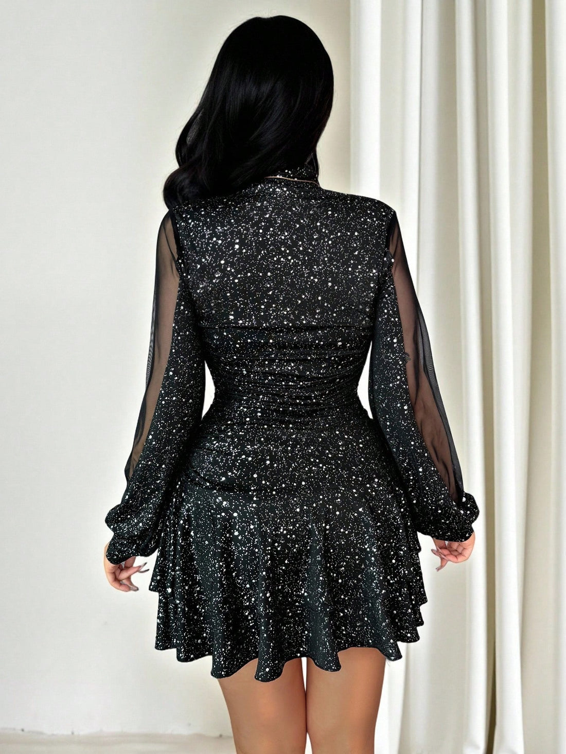 This sophisticated mini dress features an elegant sequin texture that catches light beautifully, making it an ideal choice for fall and winter celebrations. The shimmering embellishment adds glamour and dimension while the mini silhouette offers a modern, flattering cut. Perfect for holiday parties, cocktail events, or festive gatherings, this dress transitions seamlessly from evening occasions to special dinners. The sequin detailing provides visual interest without overwhelming the design, allowing you to