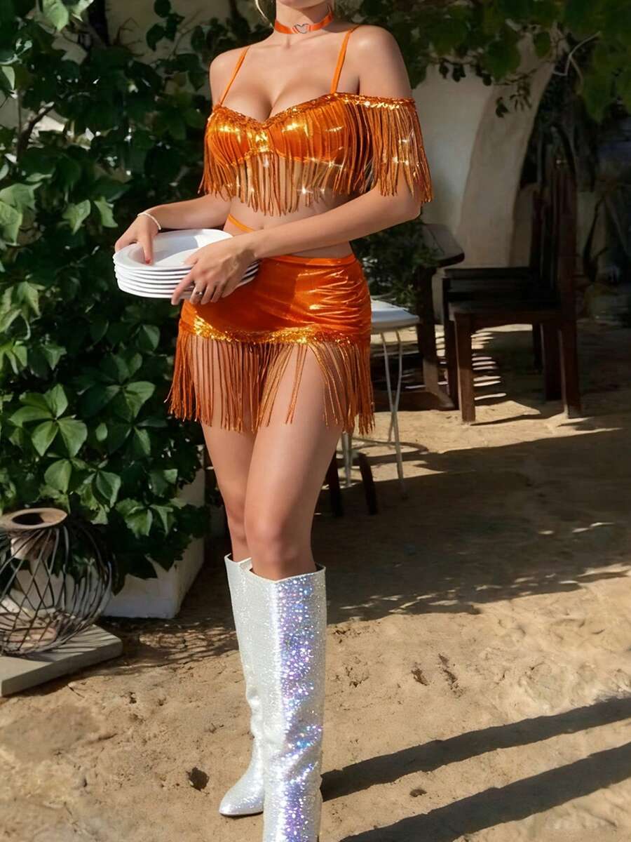 Full outdoor view of orange sequin tassel party costume set with choker