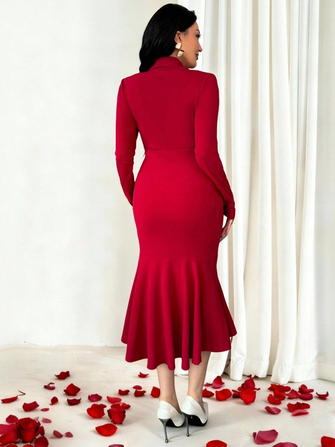 Elevate your wardrobe with this sophisticated wine red fishtail dress, expertly designed to transition seamlessly from office to evening occasions. The tailored blazer collar adds professional polish and structure, while the graceful fishtail hem creates an elegant silhouette that flatters and commands attention. Crafted for versatility, this piece works beautifully for Valentine's celebrations, business settings, and formal events. The rich wine tone complements various skin tones and pairs effortlessly wi