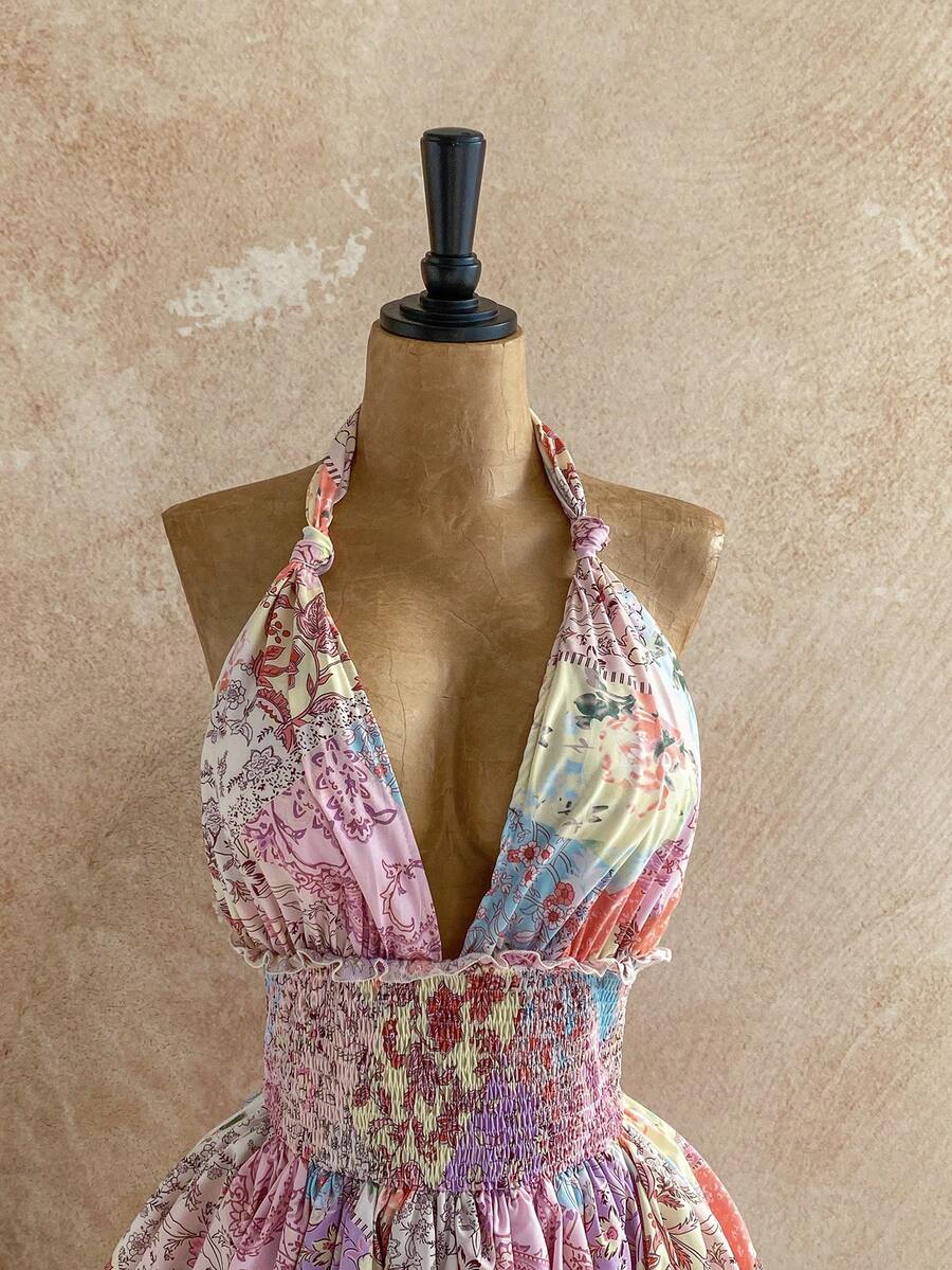 Embrace effortless elegance with this stunning floral midi dress, designed for those who love bohemian charm. The delicate pleated silhouette creates graceful movement, while the distinctive bow halter neckline adds a touch of sophistication. Perfect for summer getaways, beach days, or casual garden parties, this dress transitions seamlessly from day to evening. The vibrant floral print captures the essence of carefree style, making it an essential piece for your warm-weather wardrobe. 