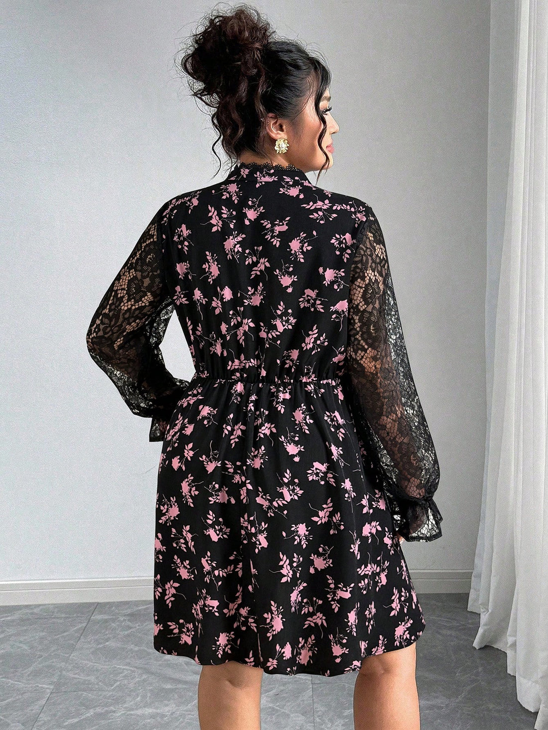 Embrace your curves in this stunning plus-size dress that's equal parts sophisticated and fun! Featuring delicate floral lace inserts that peek through the classic black fabric, this piece is your go-to for autumn and winter gatherings. The elegant lace detailing adds a touch of romance without sacrificing comfort, making it perfect for casual outings or dressier occasions. Slip it on and feel confident, comfortable, and absolutely fabulous—because style has no size limit!