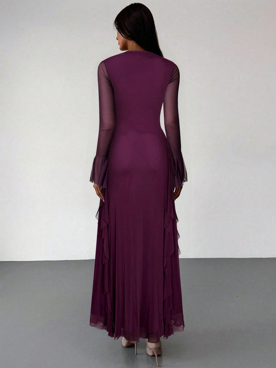 Slip into sophistication with this stunning purple dress that's ready for anything your calendar throws at it. The graceful ruffle hem adds a flirty touch while long sleeves keep you cozy through chilly seasons. Whether you're heading to a romantic dinner, celebrating with friends, or impressing at the office, this versatile piece transitions seamlessly from day to night. The rich purple hue flatters every complexion, making you feel confident and fabulous. Dress it up with heels and jewelry or keep it casu