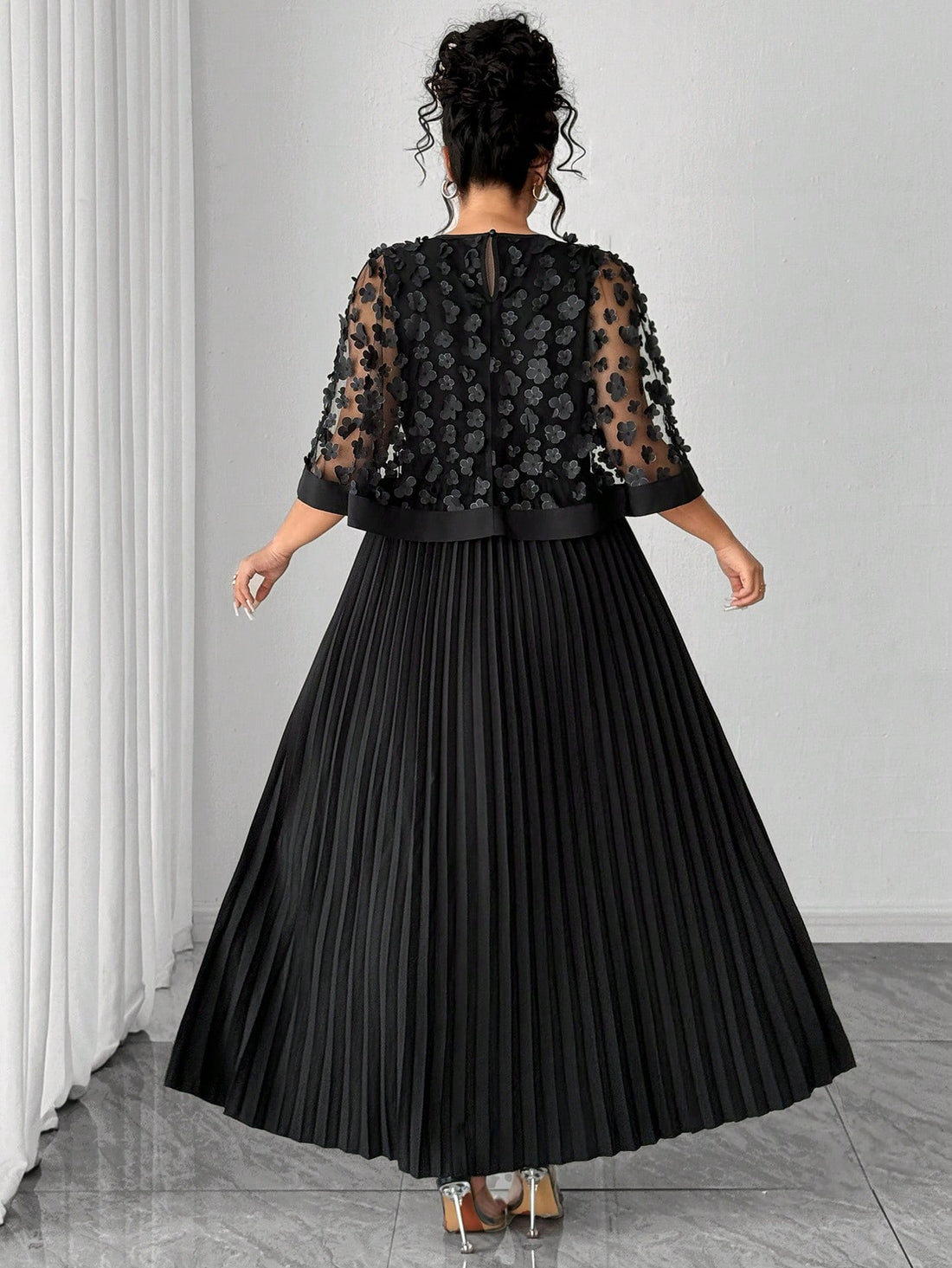 Elevate your wardrobe with this stunning plus-size dress that's all about making a statement! The intricate 3D floral mesh design adds dimension and visual interest, while the pleated silhouette creates a flattering, flowing fit that moves beautifully with you. Perfect for special occasions or when you want to feel absolutely fabulous, this dress combines elegance with comfort. The delicate mesh detailing brings sophistication without the fuss—just slip it on and let the dress do the talking. A true showsto