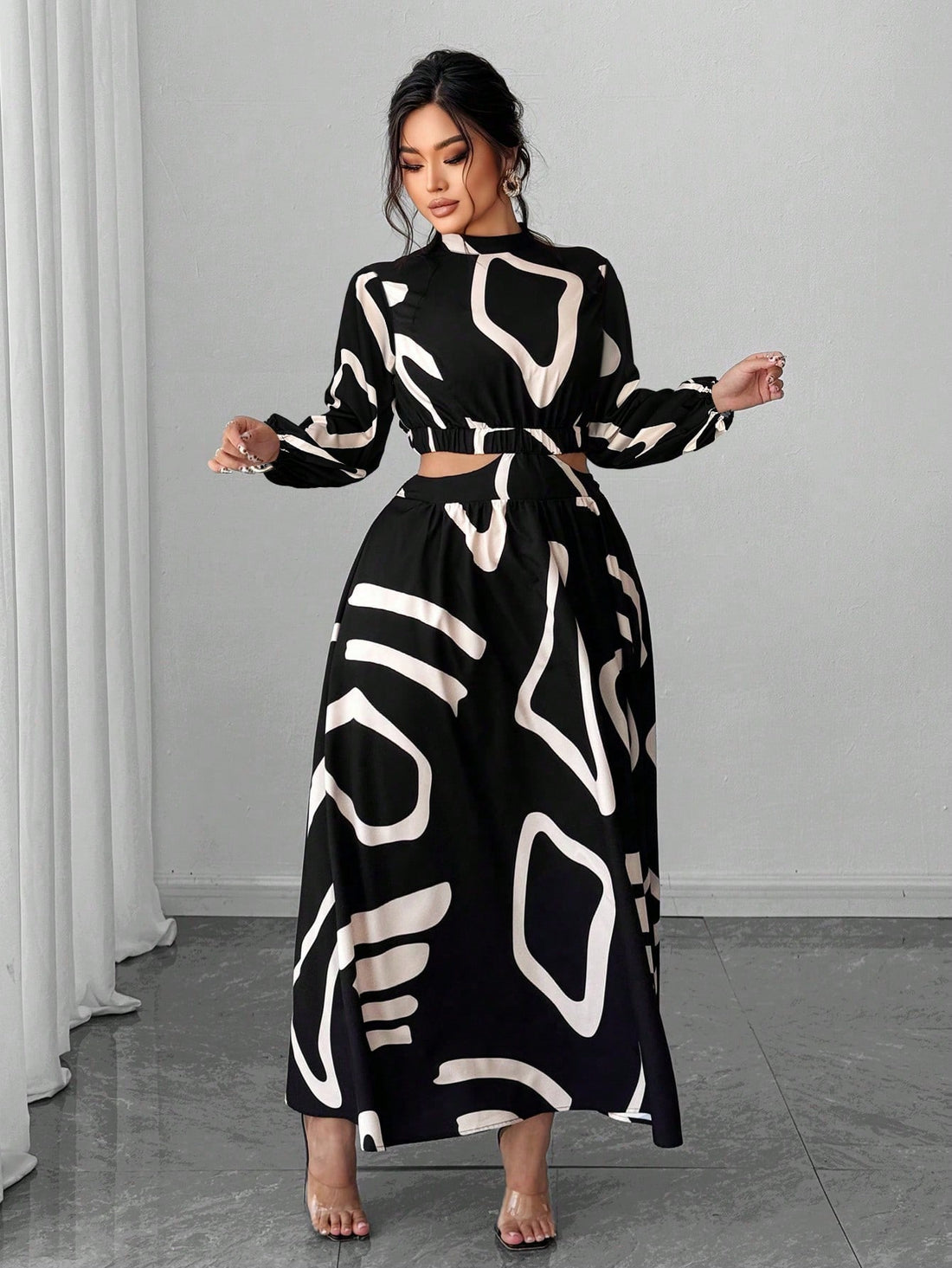 Elevate your everyday wardrobe with this stunning plus-size dress that effortlessly transitions from office to weekend plans. The long sleeves provide polished coverage while the strategic cutout at the waist creates a flattering silhouette that celebrates your curves. Crafted for comfort and style, this versatile piece pairs beautifully with sneakers for casual vibes or heels for a night out. Whether you're commuting to work or meeting friends for brunch, this dress delivers chic sophistication without the