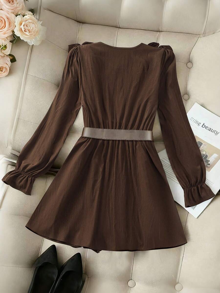 Elevate your wardrobe with this sophisticated vintage-inspired mini dress in rich coffee brown. Featuring an eye-catching ruffled hem and extra-long sleeves, this piece delivers timeless elegance with modern flair. Crafted from a durable woven blend of polyester and polyamide, the regular fit silhouette flatters effortlessly. The unlined construction keeps it lightweight and breathable, perfect for layering or wearing solo. Machine washable for easy care, this dress transitions seamlessly from casual outing