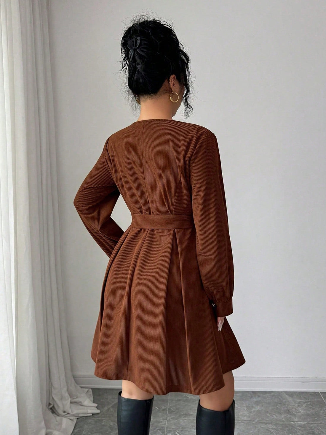 Step into timeless style with this charming corduroy A-line dress that brings vintage vibes to your everyday wardrobe. The soft, textured corduroy fabric drapes beautifully in a flattering silhouette, while gleaming metal button details add a touch of sophistication. Perfect for casual outings or dressed-up occasions, this short dress pairs effortlessly with sneakers, boots, or heels. A playful nod to retro fashion that feels fresh and modern—because looking good never goes out of style.