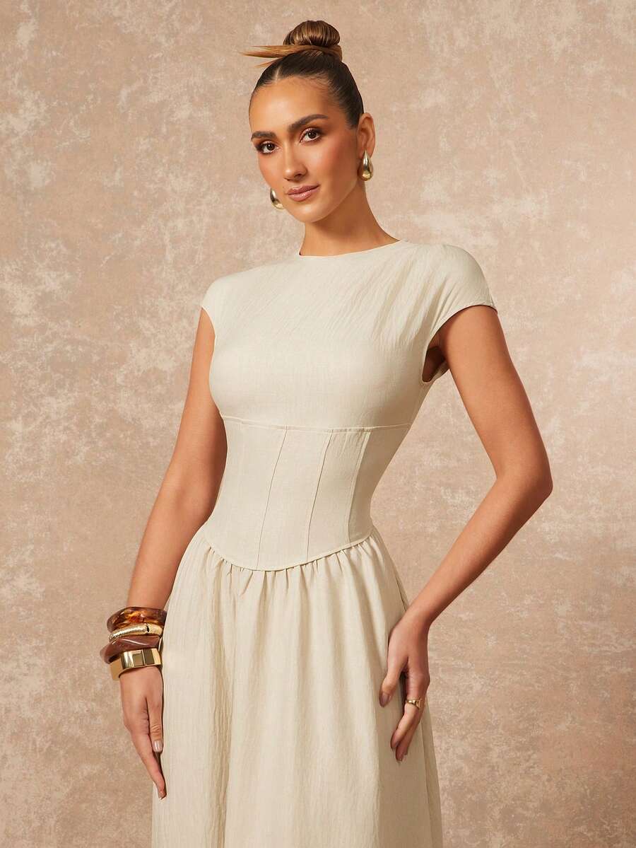 Exude Timeless Grace in Our Elegant Soft Ivory Corset Maxi Dress!

Step into a world of refined luxury with this breathtaking ivory masterpiece. Designed to evoke the romance of a bygone era while maintaining a modern, high-fashion edge, this dress is the ultimate choice for your most prestigious events and intimate celebrations.

Sculpted Boned Bodice: The masterfully crafted corset waist with internal boning provides structural support and a cinched silhouette, offering a regal and flattering fit that hig