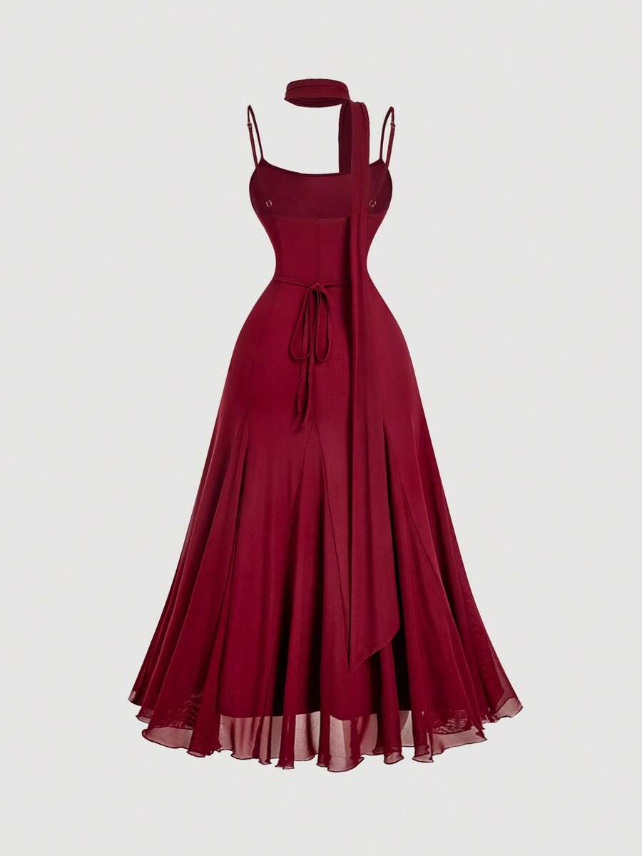 Make an unforgettable impression in this luxurious plus-size burgundy maxi dress, engineered for those who demand both refinement and comfort. The signature scarf collar introduces an element of sophisticated flair, while the suspender design creates a polished, structured look that flatters generously. Whether attending a destination celebration, marking a special birthday, or witnessing vows exchanged, this versatile piece delivers timeless elegance. The deep burgundy tone offers universal appeal and pair