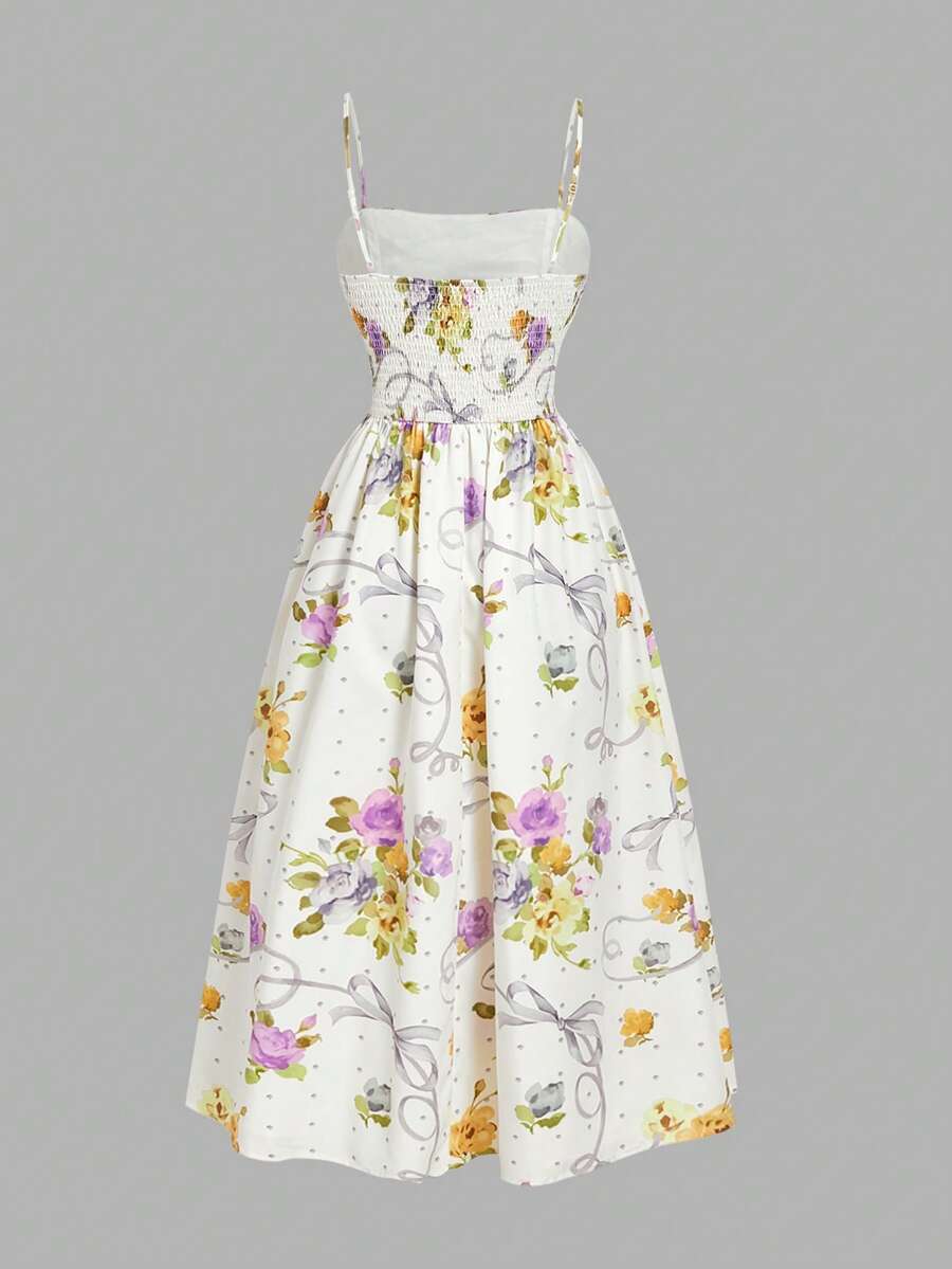 Elevate your warm-weather wardrobe with this sophisticated pastel cami dress, where refined tailoring meets botanical charm. The delicate pleated bodice creates flattering dimension while the understated plant print adds visual interest without overwhelming your silhouette. Crafted for versatility, this piece transitions seamlessly from casual daytime outings to relaxed evening gatherings. The cami neckline offers a timeless appeal, while the flowing cut ensures comfortable movement throughout your day. Per