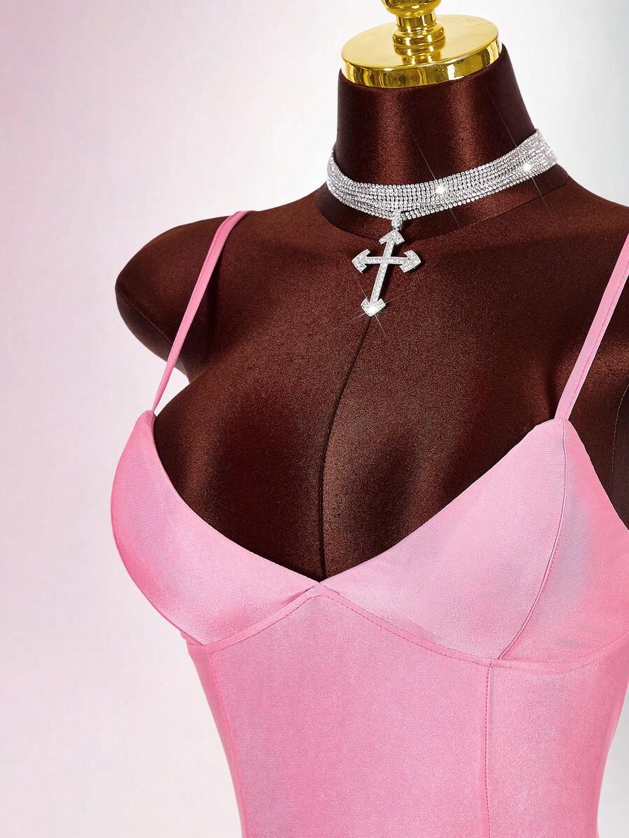 Close-up of pink cami dress sweetheart neckline and fitted bodice