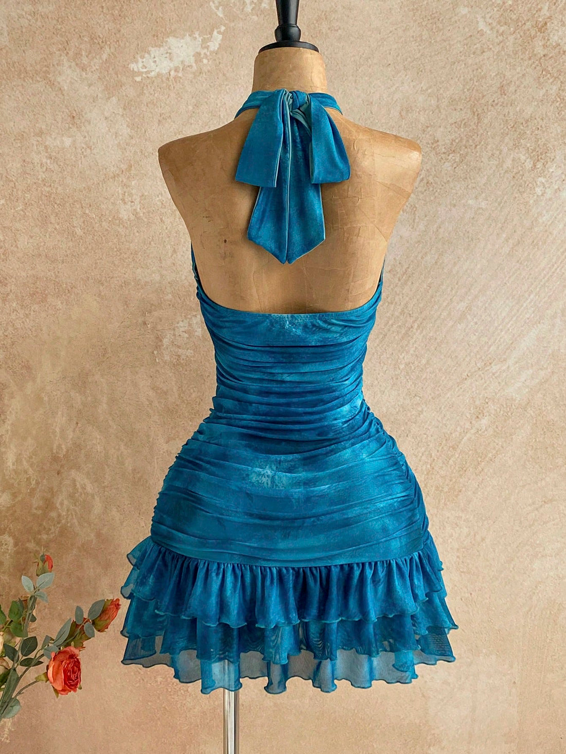 Embrace effortless sophistication with this boho backless mini dress, designed for those who appreciate understated elegance. The open back creates a striking silhouette while maintaining refined grace, making it ideal for spring and summer celebrations. Whether you're attending a destination wedding, exploring a tropical getaway, or dancing through festival grounds, this piece transitions seamlessly from day to evening. The flowing mini length and bohemian aesthetic offer comfort without compromising style