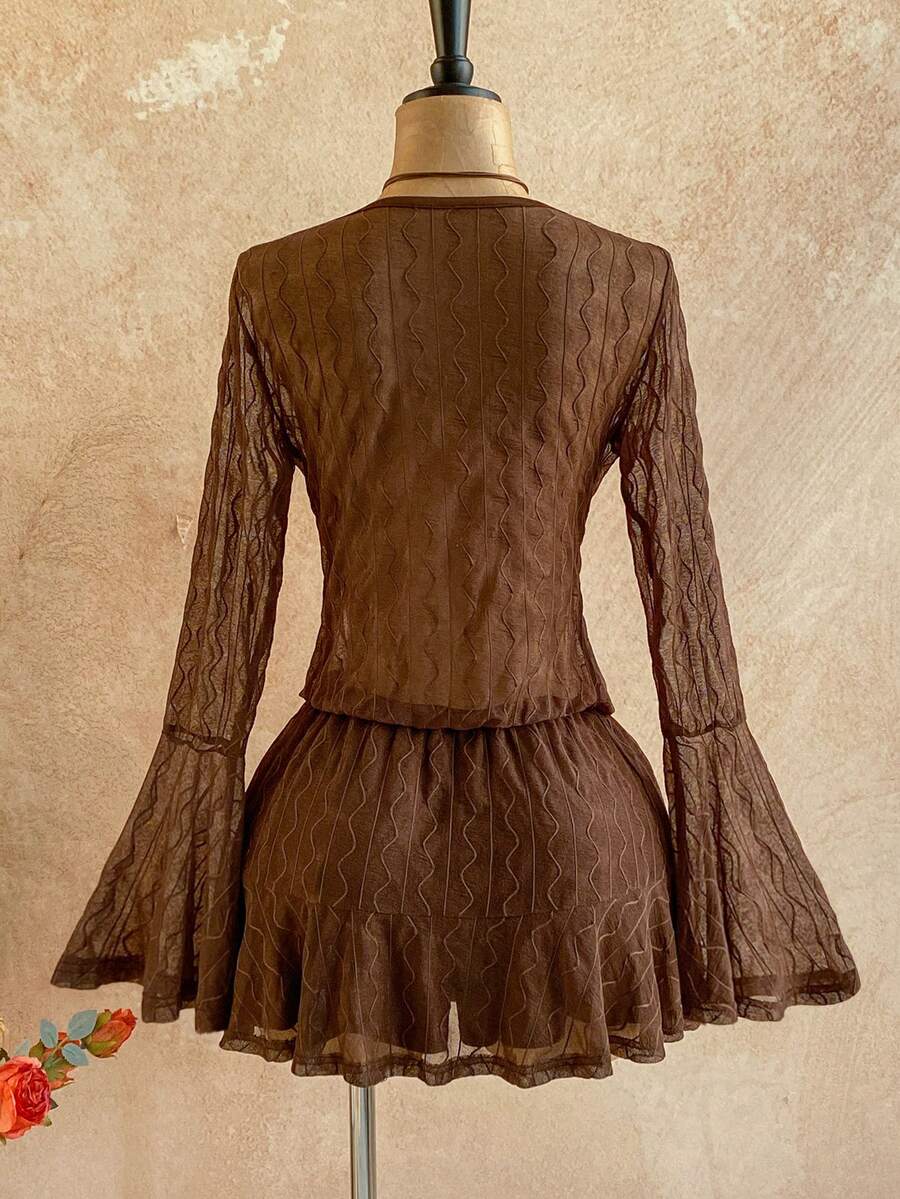 Elevate your summer wardrobe with this stunning brown mini dress featuring a daring plunging neckline and graceful flare sleeves. The A-line silhouette with high waist creates a flattering, feminine shape, while asymmetrical details and a ruffled hem add visual interest. Crafted from a soft knitted fabric blend with high stretch, this semi-sheer dress offers comfort and movement. Perfect for beach outings, festivals, or casual summer occasions, it's the effortless piece you'll reach for again and again. Mac