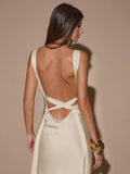 Front view of ivory sleeveless deep V-neck maxi dress with crossed open back, shown for wedding and evening wear