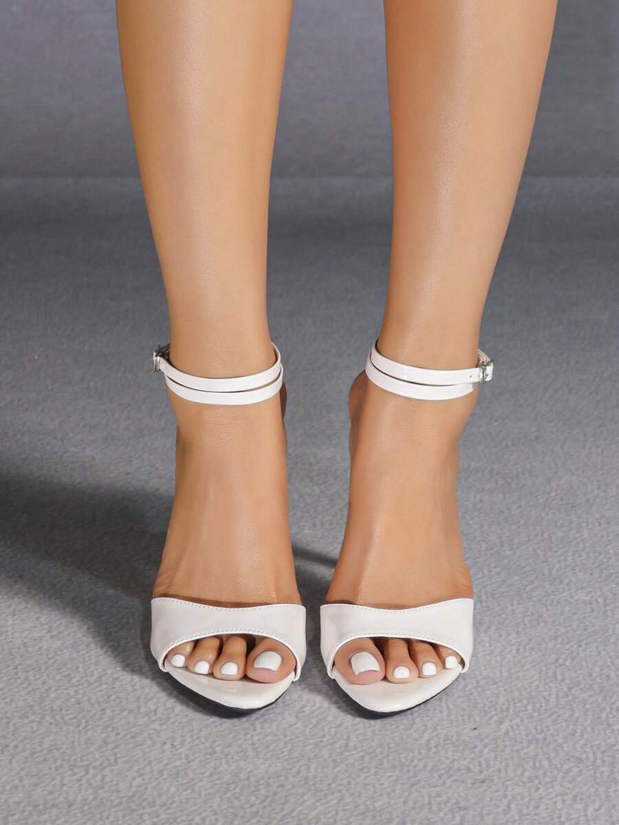 Sleek Leopard Print Stiletto Sandals: Open Toe Patent Leather Elegance