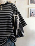 Back view of Chic Minimalist Striped Cotton T-Shirt for Women - Perfect Gift for Friends for women styling