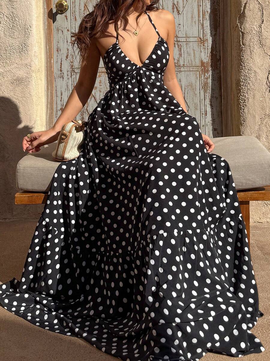 Make a statement this season in our Elegant Black Polka Dot Deep V Neck Halter Maxi Dress. Featuring a flattering halter neckline, backless design, and high-waisted A-line silhouette, this boho-inspired piece is perfect for beach getaways and vacation adventures. The ruffle hem and flounce detailing add movement and charm, while the sleeveless cut keeps you cool. Crafted from a breathable 97% polyester and 3% elastane blend, this versatile dress transitions effortlessly from day to night. Machine washable f