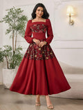 Full view of burgundy embroidered long sleeve A-line maxi dress with flared skirt