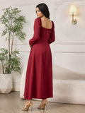 Back view of burgundy long sleeve maxi dress with square open-back neckline and zipper