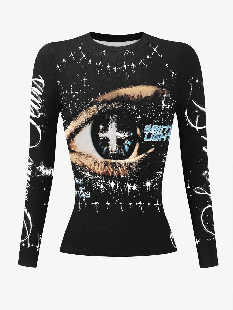 Front product view of black crew-neck top with eye, cross, script, and paint graphics