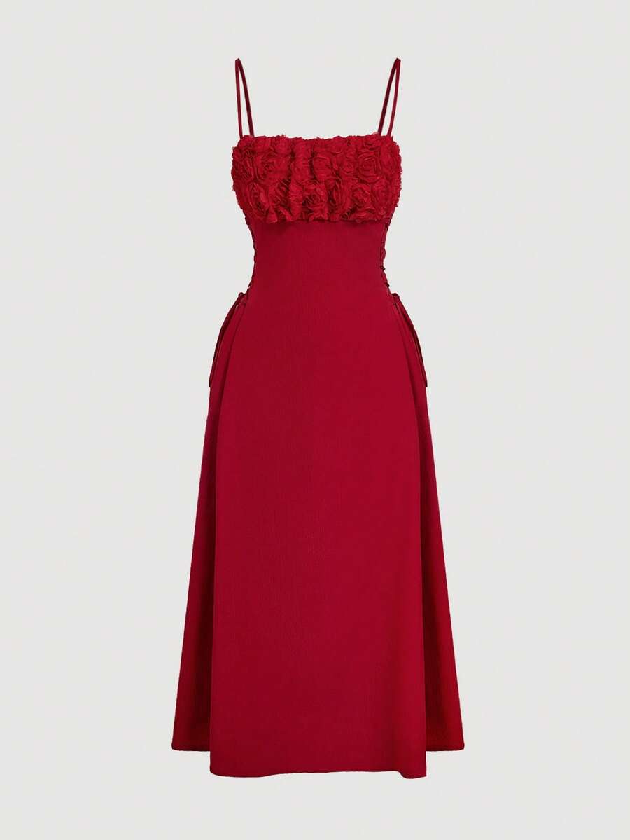 Elevate your everyday wardrobe with this striking red cami dress, designed for modern sophistication. The ruched bust creates flattering dimension while the lace-up side detail adds an unexpected edge to the silhouette. Cut in a flowing long length, this piece transitions seamlessly from casual days to evening occasions. The cami neckline offers versatile styling options—wear it solo for a bold statement or layer it effortlessly under jackets and cardigans. Crafted for comfort and style, this dress delivers