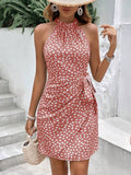 Coral pink halter mini dress with wrap-style skirt