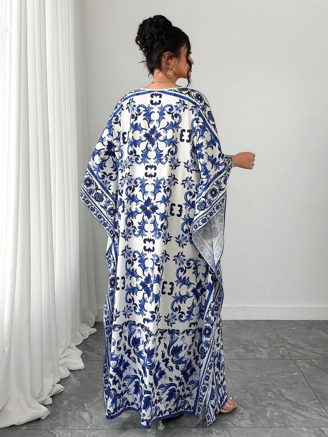 Escape the ordinary in this stunning batwing sleeve dress that celebrates timeless Chinoiserie artistry. Perfect for plus-size figures, the relaxed silhouette drapes beautifully while the dramatic sleeves add instant flair to your vacation wardrobe. The intricate print whispers stories of Eastern elegance, transforming any getaway into a fashion moment. Slip it on and let wanderlust do the talking—comfort meets style in the most effortless way possible.