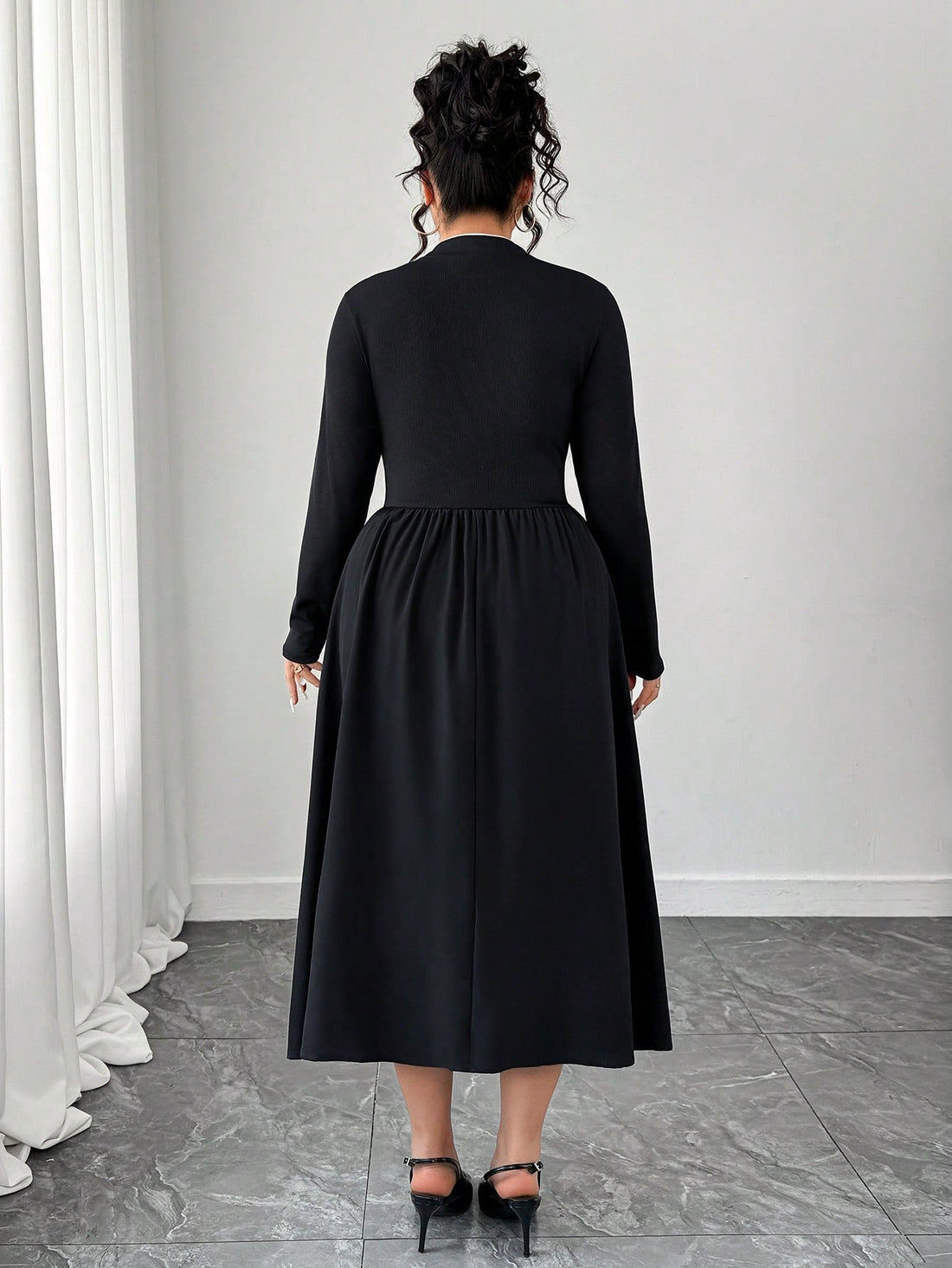 Embrace the season in style with this charming plus-size autumn dress that's ready for anything your day throws at you. The crisp button front adds a touch of sophistication, while the contrasting trim details frame your silhouette beautifully. Perfect for layering with your favorite cardigan or jacket, this versatile piece transitions seamlessly from casual coffee dates to weekend errands. The relaxed fit ensures all-day comfort without compromising on elegance. Whether you're dressing up or keeping it low